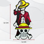 The Monkey D. Luffy 3D Printed Figurine (32 cm) features Luffy in a yellow hat and red jacket behind a skull and crossbones with a matching yellow hat; measuring 32 cm tall and 16 cm wide—ideal anime decor or One Piece collectible.